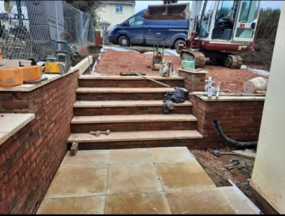 Brick piers and natural stone steps