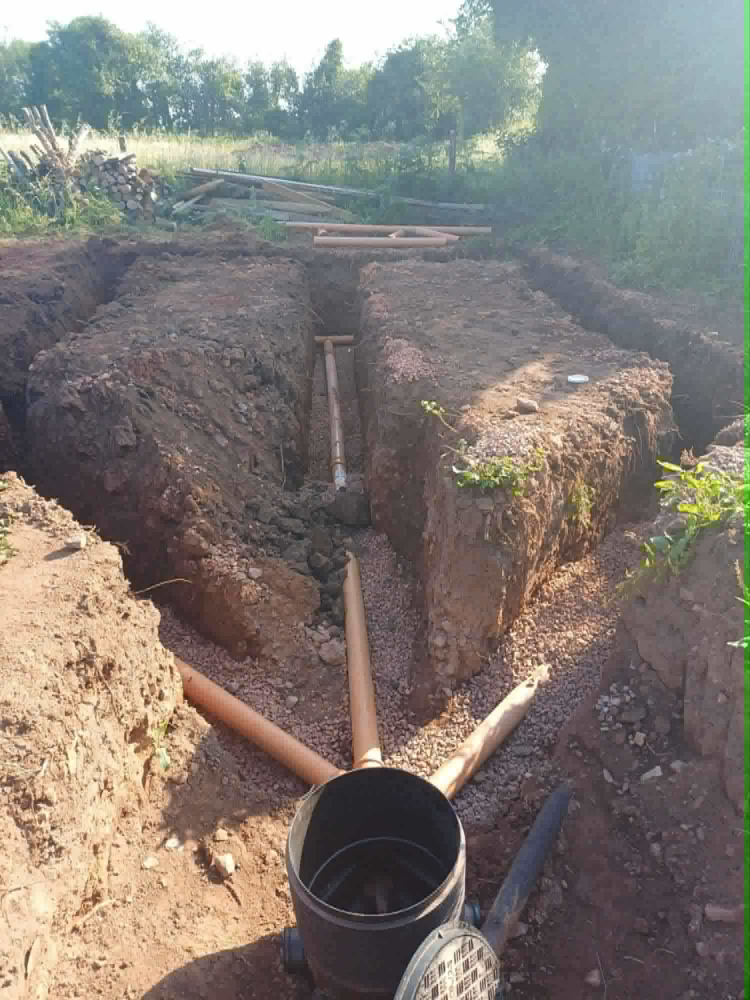 Drainage pipe laying in trench